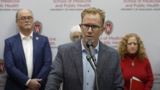 Dr. Sterling Johnson addresses the media at a press conference on March 6, 2025