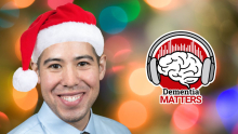 A photo of Dr. Nathaniel Chin smiling in a santa hat next to the "Dementia Matters" podcast logo